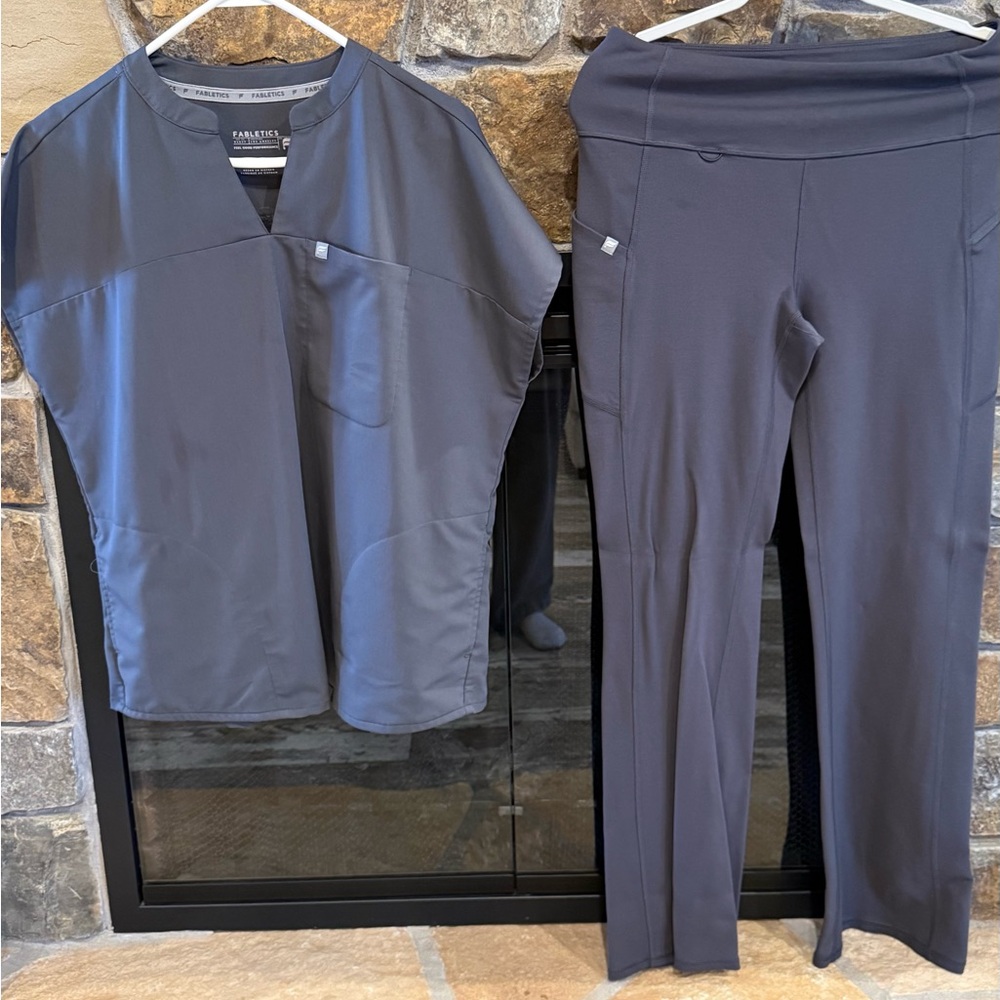 Grey Fabletics scrubs with kick flare leggings